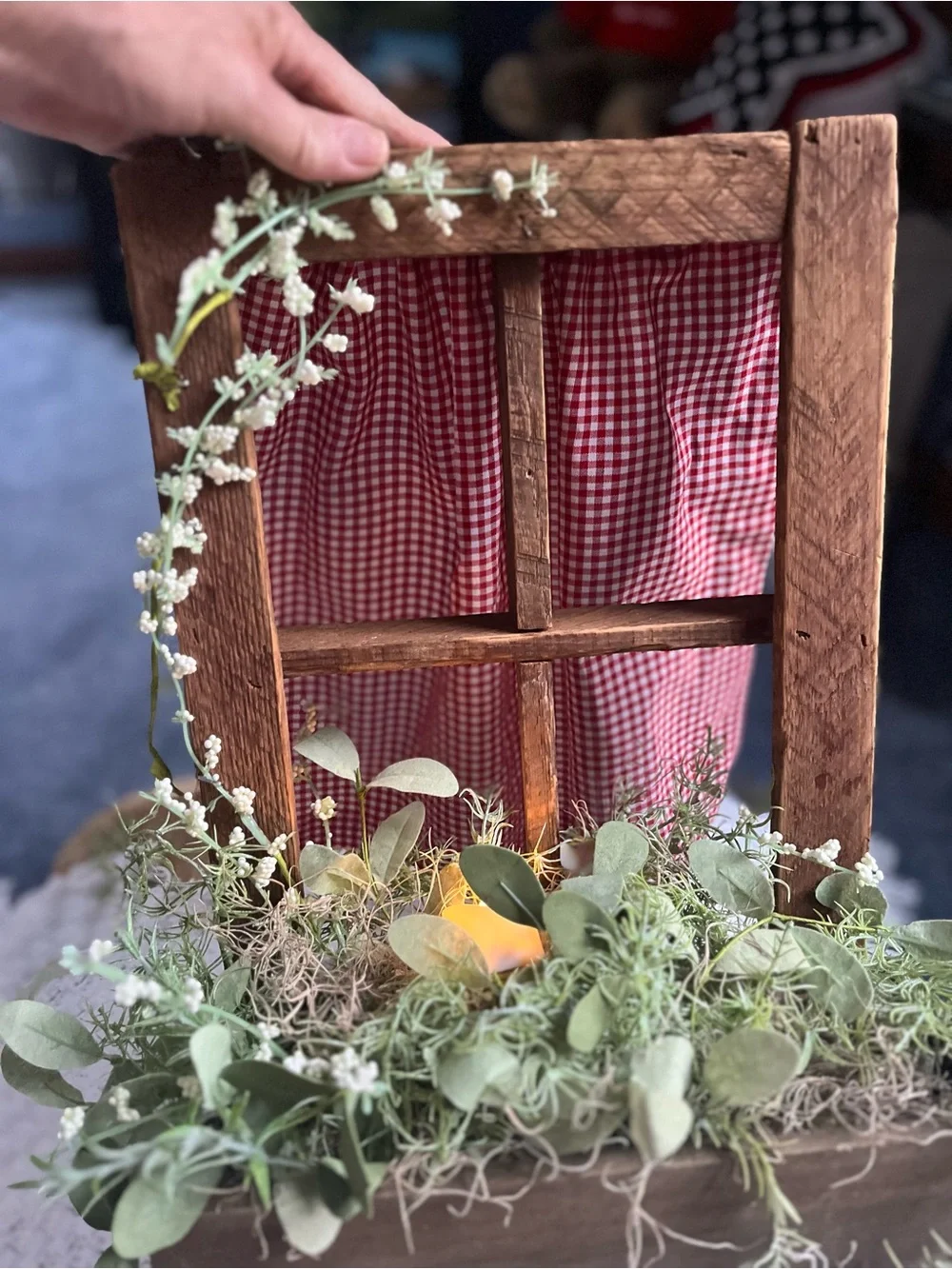 Rustic Windowbox Accent with Greenery and Soft Candle Light